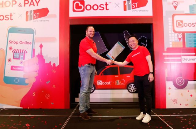Christopher Tiffin (CEO of Boost) and CHEONG Chia Chou (CEO of 11street) 11street unveil the Win a Car campaign launching from 28 September.