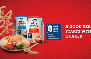 Adding Quaker oats and Kellogg’s cornflakes into the Prosperity Toss (Yee Sang)