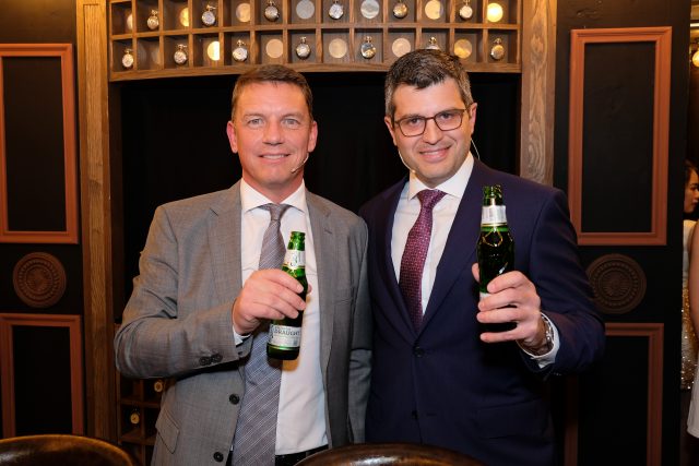 Carlsberg Malaysia's outgoing Managing Director Lars Lehmann (L) and new Managing Director Ted Akiskalos