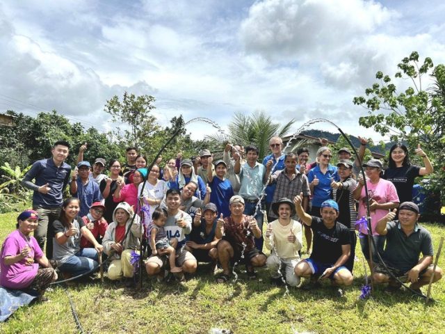 The Sayap Magambai villagers and project team marking the completion of the community's gravity water project (1)
