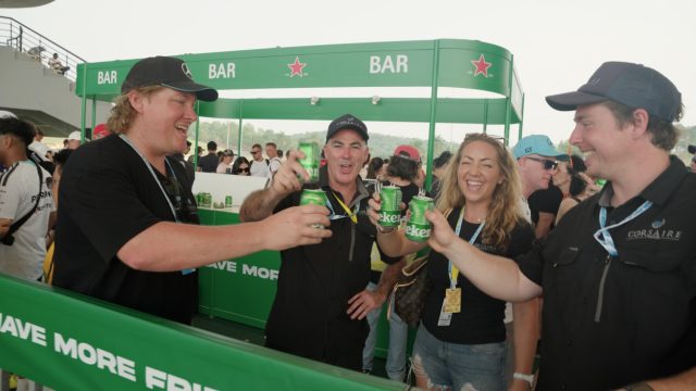 Guests coming together at a Heineken® bar during the F1® race weekend at Sepang International Circuit.